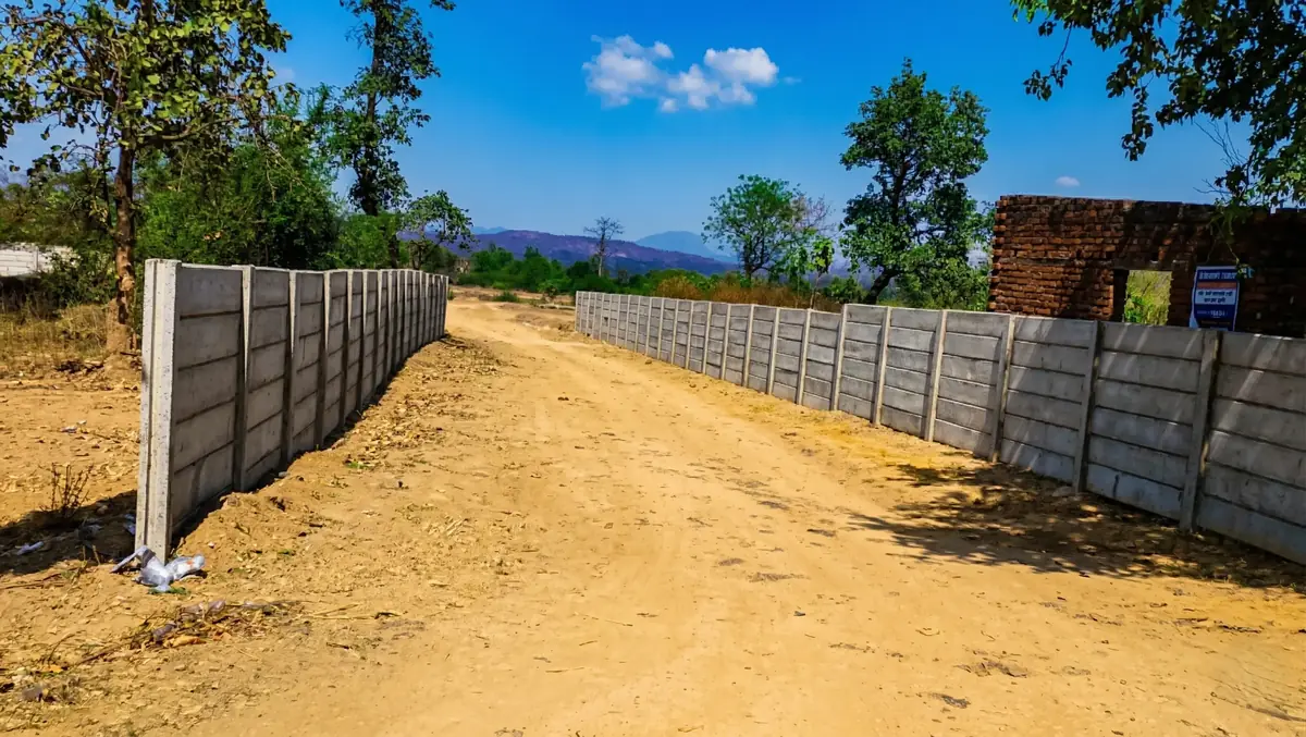 Secure boundary wall of Bajrang Dham township